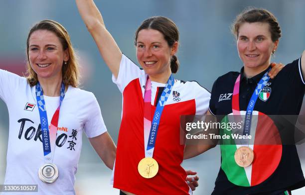 Silver medalist Annemiek van Vleuten of Team Netherlands, gold medalist Anna Kiesenhofer of Team Austria, and bronze medalist Elisa Longo Borghini of...