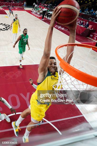 Dante Exum of Team Australia dunks against Nigeria in the first half of their Men's Preliminary Round Group B game on day two of the Tokyo 2020...