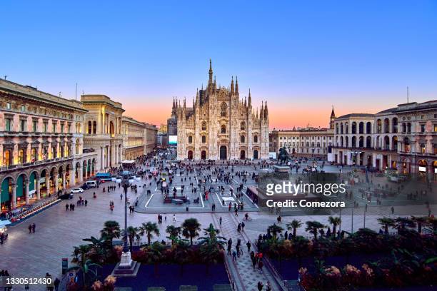 milan piazza del duomo at sunset, italy - milan stock pictures, royalty-free photos & images