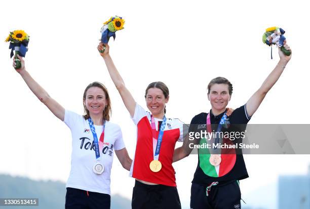 Silver medalist Annemiek van Vleuten of Team Netherlands, gold medalist Anna Kiesenhofer of Team Austria, and bronze medalist Elisa Longo Borghini of...