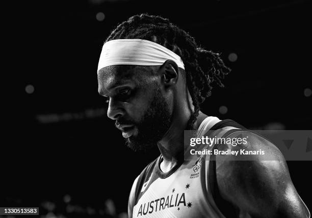 Patty Mills of Australia is seen coming from the court at the halftime break during the preliminary rounds of the Men's Basketball match between...