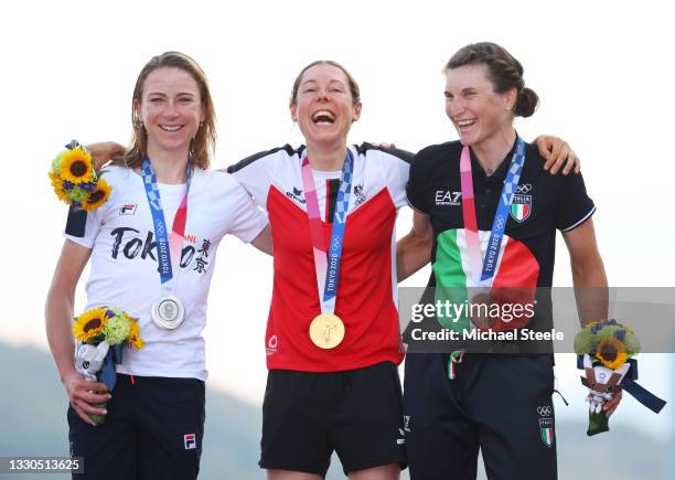 Silver medalist Annemiek van Vleuten of Team Netherlands, gold medalist Anna Kiesenhofer of Team Austria, and bronze medalist Elisa Longo Borghini of...