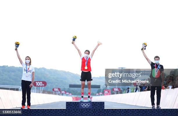 Silver medalist Annemiek van Vleuten of Team Netherlands, gold medalist Anna Kiesenhofer of Team Austria, and bronze medalist Elisa Longo Borghini of...