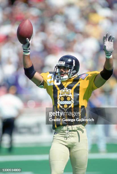 Cornerback Rod Woodson of the Pittsburgh Steelers, wearing a throwback legacy jersey based on the uniform worn by the Steelers in 1933 and bearing...
