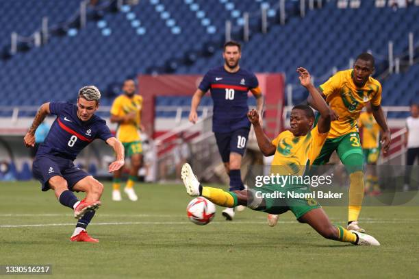 Enzo Le Fee of Team France shoots whilst under pressure from Thabo Cele of Team South Africa during the Men's First Round Group A match between...