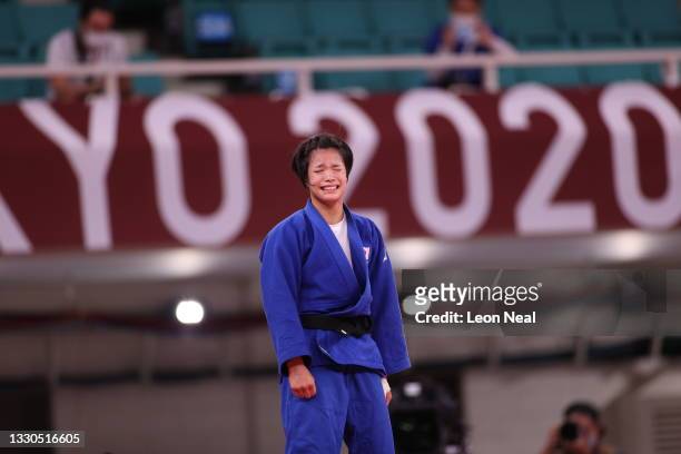 Uta Abe of Team Japan reacts after she defeated Amandine Buchard of Team France during the Women’s Judo 52kg Final on day two of the Tokyo 2020...