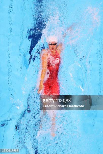 Kylie Masse of Team Canada competes in heat four of the Women's 100m Backstroke on day two of the Tokyo 2020 Olympic Games at Tokyo Aquatics Centre...