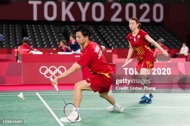 Yuta Watanabe and Arisa Higashino of Team Japan compete against Simon Wing Hang Leung and Gronya Somerville of Team Australia during a Mixed Doubles...