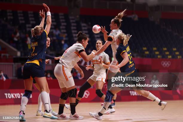 Nerea Pena Abaurrea of Team Spain passes the ball whilst under pressure from Emma Lindqvist of Team Sweden during the Women's Preliminary Round Group...