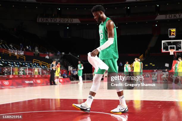 Chimezie Metu of Team Nigeria walks off the court after being ejected from the Men's Preliminary Round Group B game against Australia on day two of...