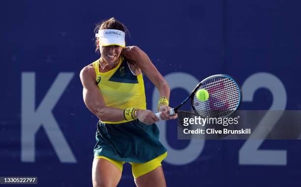 Ajla Tomljanovic of Team Australia plays a backhand during her Women's Singles First Round match against Yaroslava Shvedova of Team Kazakhstan on day...