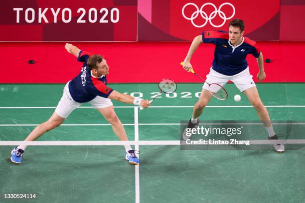 Mark Lamsfuss and Marvin Seidel of Team Germany compete against Li Jun Hui and Liu Yu Chen of Team China during a Men's Doubles Group C match on day...