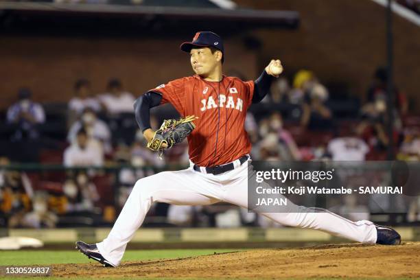 Pitcher Suguru Iwazaki of Samurai Japan throws in the 7th inning during the practice game between Samurai Japan and Yomiuri Giants at Rakuten Seimei...