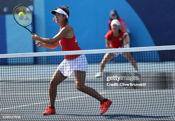 Shuko Aoyama of Team Japan and Shuko Aoyama of Team Japan play Viktorija Golubic of Team Switzerland and Belinda Bencic of Team Switzerland on day...