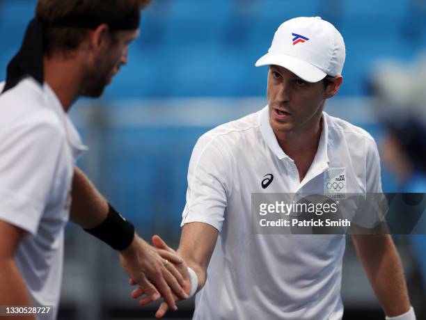 Michael Venus of Team New Zealand and Marcus Daniell of Team New Zealand during their Men's Doubles First Round match against Egor Gerasimov of Team...
