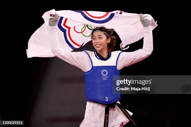 Lo Chia-ling of Team Chinese Taipei celebrates after defeating Tekiath Ben Yessouf of Team Niger during the Women's -57kg Taekwondo Bronze Medal...