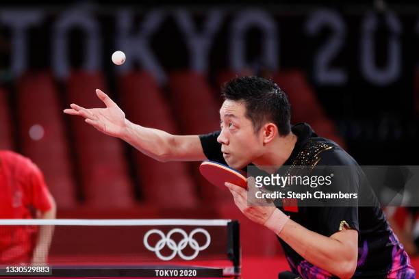 Xu Xin of Team China serves the ball during his Mixed Doubles Semifinal match on day two of the Tokyo 2020 Olympic Games at Tokyo Metropolitan...