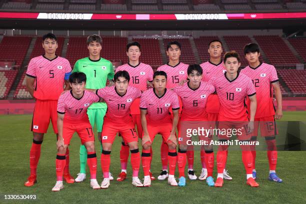 Players of Team South Korea pose for a team photograph prior to the Men's First Round Group B match between Romania and Republic of Korea on day two...