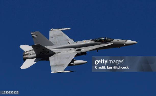 Hornet is seen flying over RAAF Base Townsville as part of Exercise 'Talisman Sabre 21' on July 25, 2021 in Townsville, Australia. Exercise Talisman...