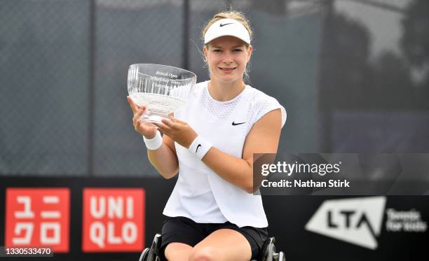 Diede De Groot of Netherlands holds British Open Wheelchair Tennis Women's Singles Trophy after beating Jordanne Whiley of Great Britain during the...