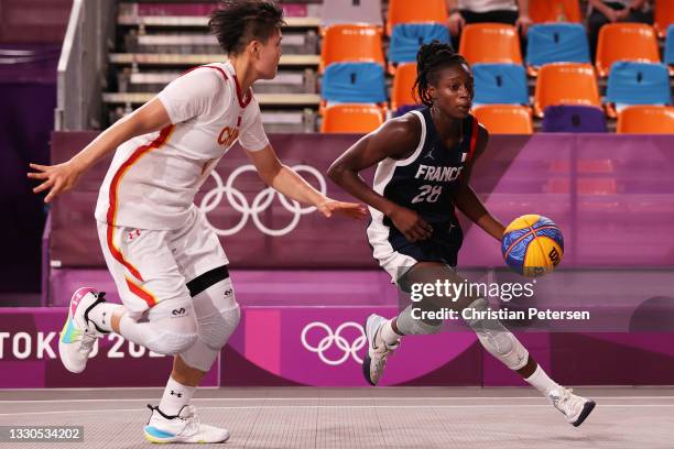 Mamignan Toure of Team France controls the ball during the Women's Pool Round match between China and France on day two of the Tokyo 2020 Olympic...