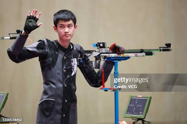 Sheng Lihao of China competes in the 10m Air Rifle Men's Final on day two of the Tokyo 2020 Olympic Games at the Asaka Shooting Range on July 25,...