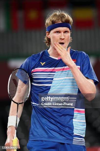 Anders Antonsen of Team Denmark competes against Nguyen Tien Minh of Team Vietnam during a Men’s Singles Group L match on day two of the Tokyo 2020...