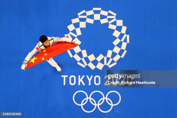 Zhao Shuai of Team China celebrates after defeating Lee Dae-Hoon of Team South Korea during the Men's -68kg Taekwondo Bronze Medal contest on day two...