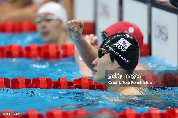 Sunwoo Hwang of Team South Korea competes in heat three of the Men's 200m Freestyle on day two of the Tokyo 2020 Olympic Games at Tokyo Aquatics...