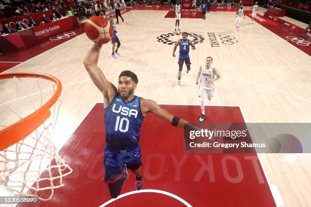 Jayson Tatum of Team United States dunks against Team France during the first half of the Men's Preliminary Round Group B game on day two of the...