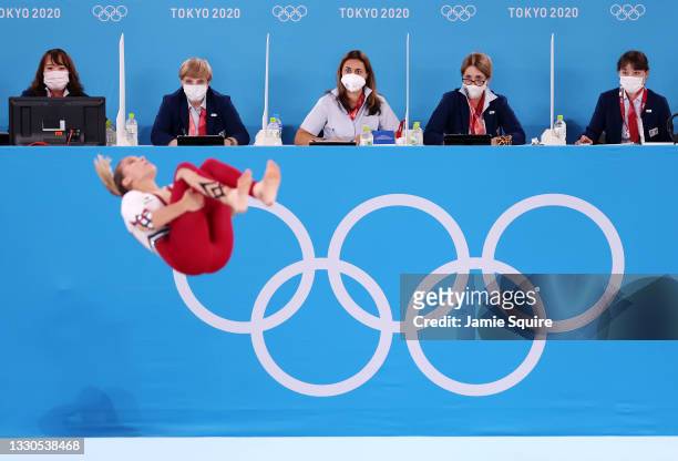 Judges look on as Elisabeth Seitz of Team Germany competes in the floor exercise during Women's Qualification on day two of the Tokyo 2020 Olympic...