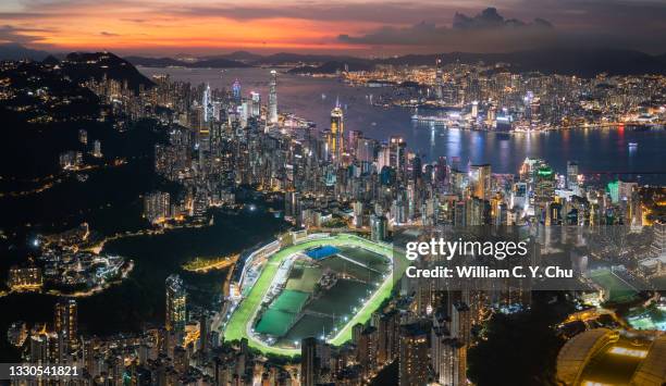 happy valley racecourse - hong kong racing stock pictures, royalty-free photos & images