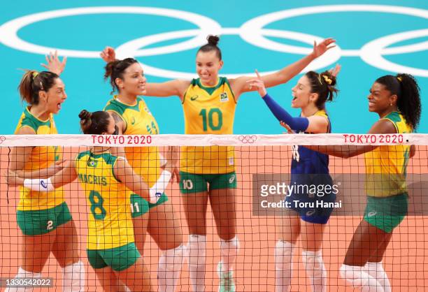 Gabriela Braga Guimaraes of Team Brazil reacts with team mates against Team South Korea during the Women's Preliminary - Pool A on day two of the...