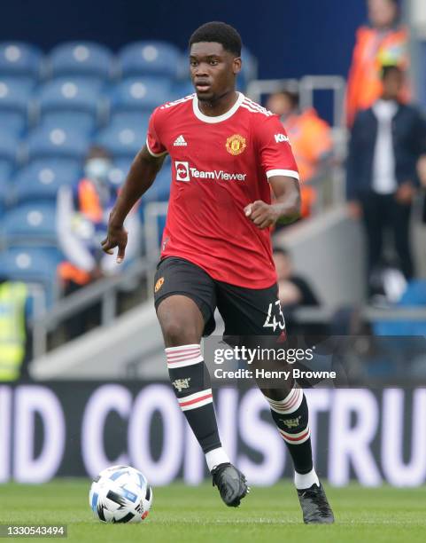 Teden Mengi of Manchester United in action during the pre-season friendly match between Queens Park Rangers and Manchester United at The Kiyan Prince...