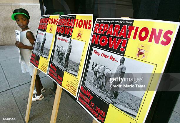 Lindi Bobb attends a slavery reparations protest outside New York Life Insurance Company offices August 9, 2002 in New York City. Protesters claim...
