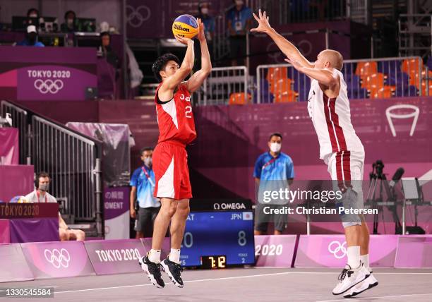 Ryuto Yasuoka of Team Japan shoots during the Men's Pool Round match between Latvia and Japan on day two of the Tokyo 2020 Olympic Games at Aomi...