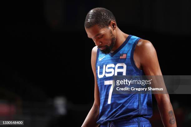 Kevin Durant of Team United States walks off the court with his head down after the United States lost to France in the Men's Preliminary Round Group...