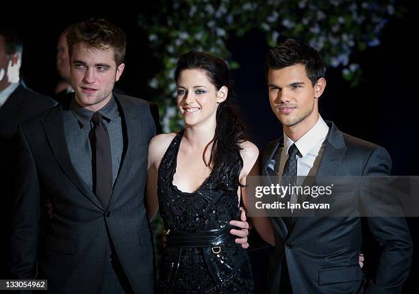 Robert Pattinson, Kristen Stewart and Taylor Lautner attend the UK premiere of The Twilight Saga: Breaking Dawn Part 1 at Westfield Stratford City on...