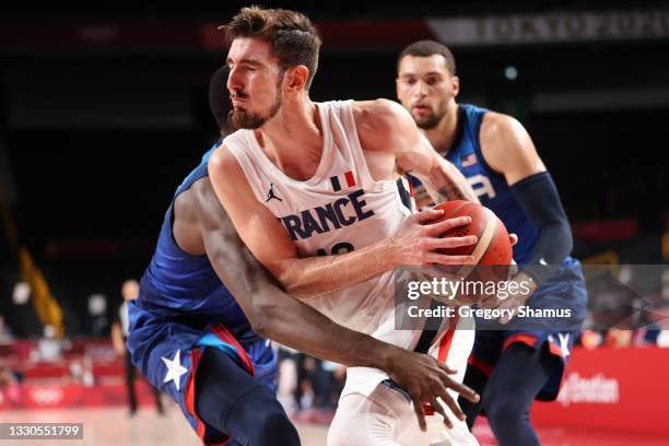 Nando de Colo of Team France drives to the basket against Team United States of America during the second half of the Men's Preliminary Round Group B...