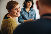 Businesswoman smiling during a meeting in office