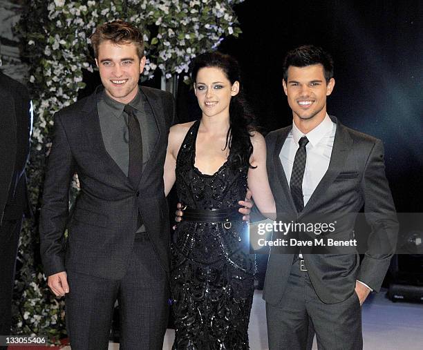 Actors Robert Pattinson, Kristen Stewart and Taylor Lautner attend the UK Premiere of 'The Twilight Saga: Breaking Dawn Part 1' at Westfield...