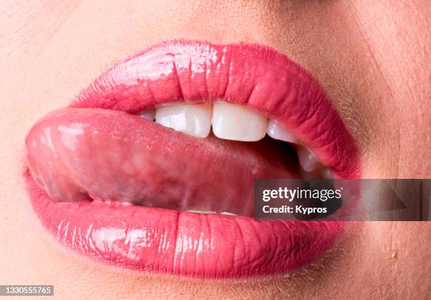Female Tooth Rouge Shiny White Teeth Photos and Premium High Res Pictures - Getty Images