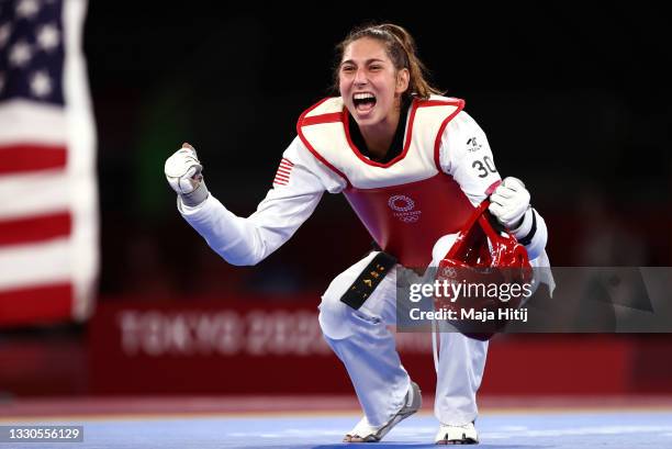 Anastasija Zolotic of Team United States celebrates after defeating Tatiana Minina of Team ROC during the Women's -57kg Taekwondo Gold Medal contest...