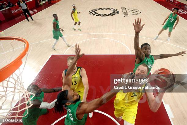 Joe Ingles of Team Australia drives to the basket against Team Nigeria during the 1st half of the Men's Preliminary Round Group B game on day two of...