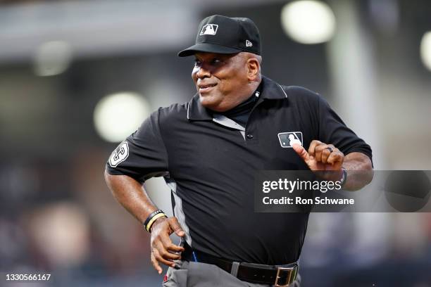 Umpire Laz Diaz heads back to the field during the sixth inning of a game between the Detroit Tigers and the Cleveland Indians at Progressive Field...