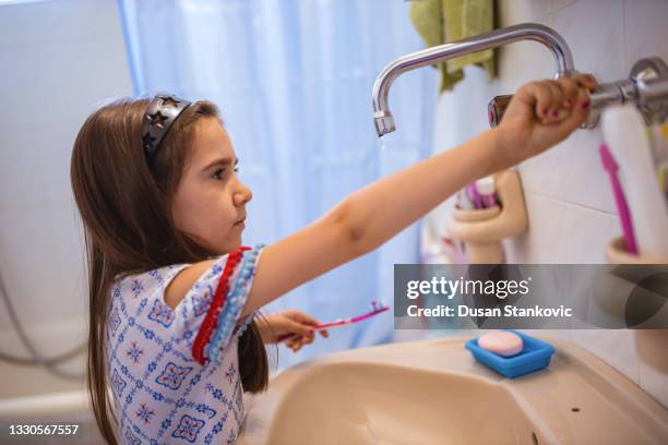 good oral hygiene begins every morning - the every girl stock pictures, royalty-free photos & images