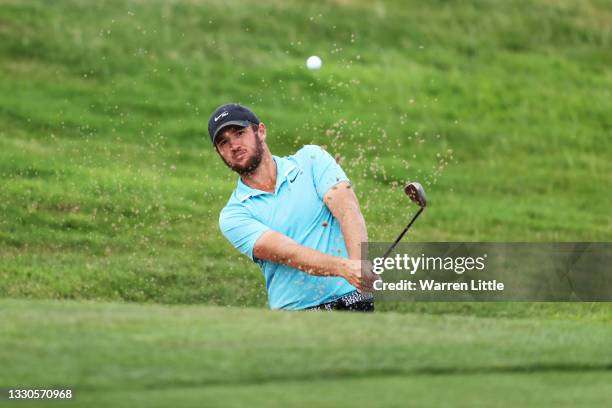 Sam Horsfield of England plays out of a bunker on the seventh hole during Day Four of the Cazoo Open supported by Gareth Bale at Celtic Manor Resort...