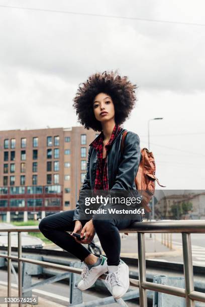 Sitting Railing 13,158 Sitting On Railing Stock Photos, High-Res Pictures, and Images ...