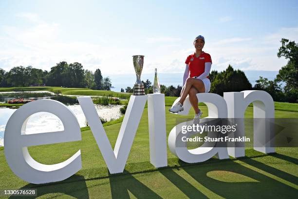 Tournament winner Minjee Lee of Australia celebrates with her trophy during day four of the The Amundi Evian Championship at Evian Resort Golf Club...