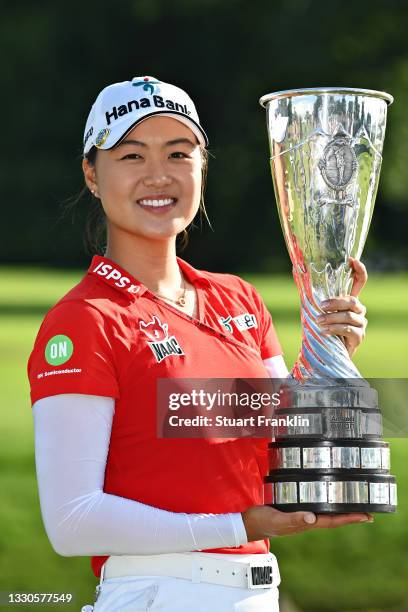 Tournament winner Minjee Lee of Australia poses for a photo with her trophy during day four of the The Amundi Evian Championship at Evian Resort Golf...